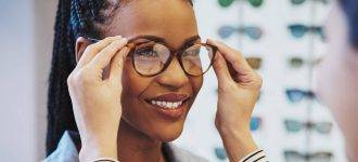 African Woman Trying on Glasses 1280x853 330x150